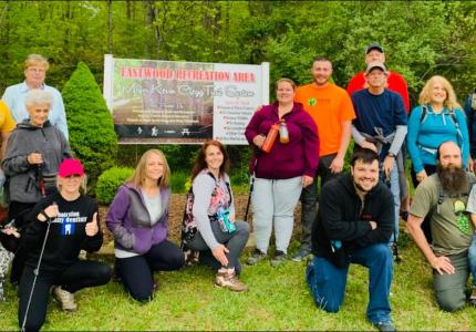 Photos of hikers at the trail entrance