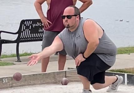 Councilman Bloxton playing bocce
