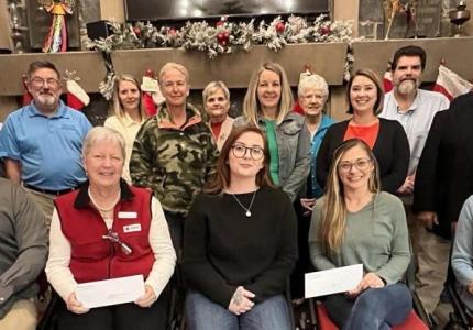 Photo of individuals accepting grants