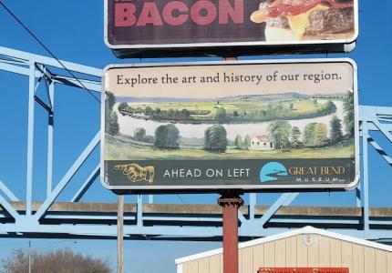 Photo of Great Bend Billboard with directional arrow pointing left