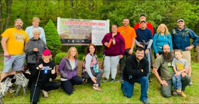 Photos of hikers at the trail entrance