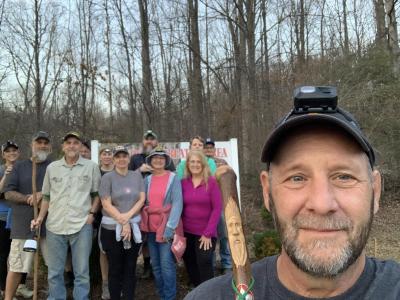 Several hikers posted at trail head