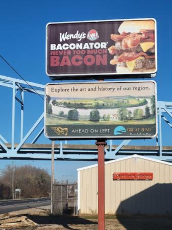 Photo of Great Bend Billboard with directional arrow pointing left