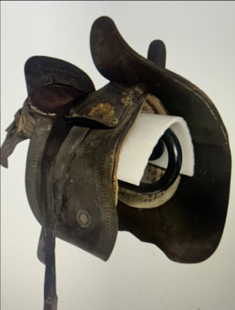Photo of vintage brown leather ladies saddle